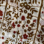 Cream scarf with tan floral design