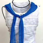 long and narrow blue scarf
