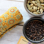 clay cup and cocktail napkins