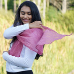 girl wearing pink Mayil scarf
