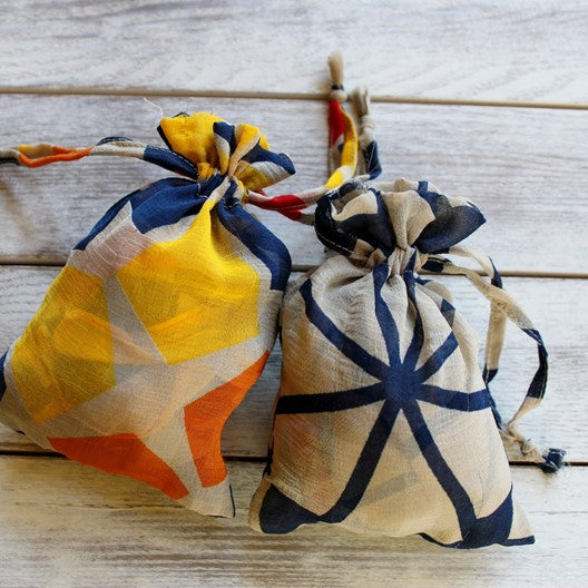 scarves with their sustainable gift bags